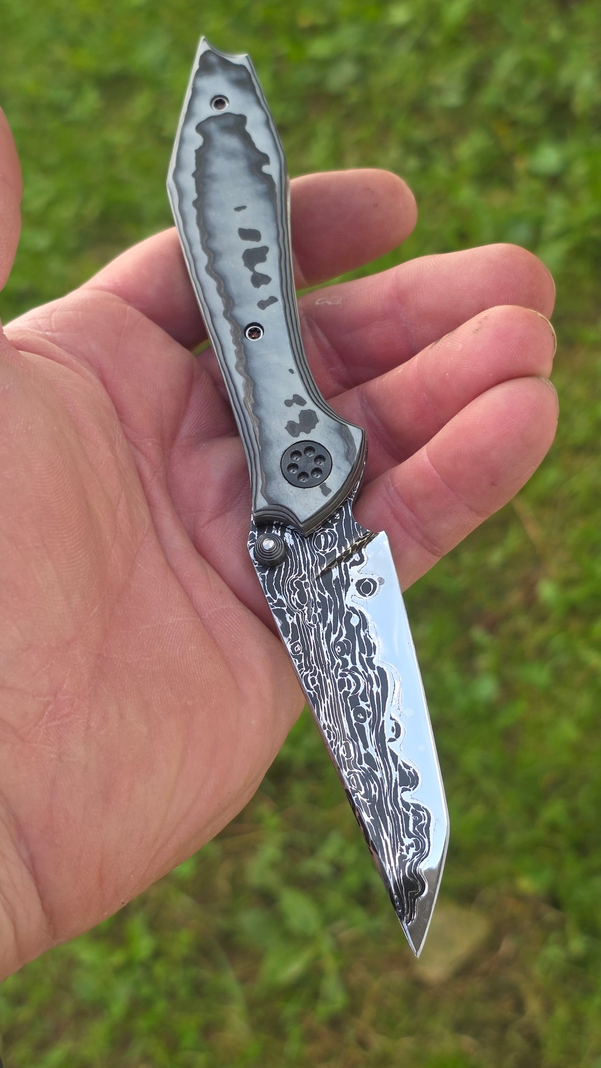 Larevo Customs Arris No. 2 custom folding knife, show side, hand-built via stock removal